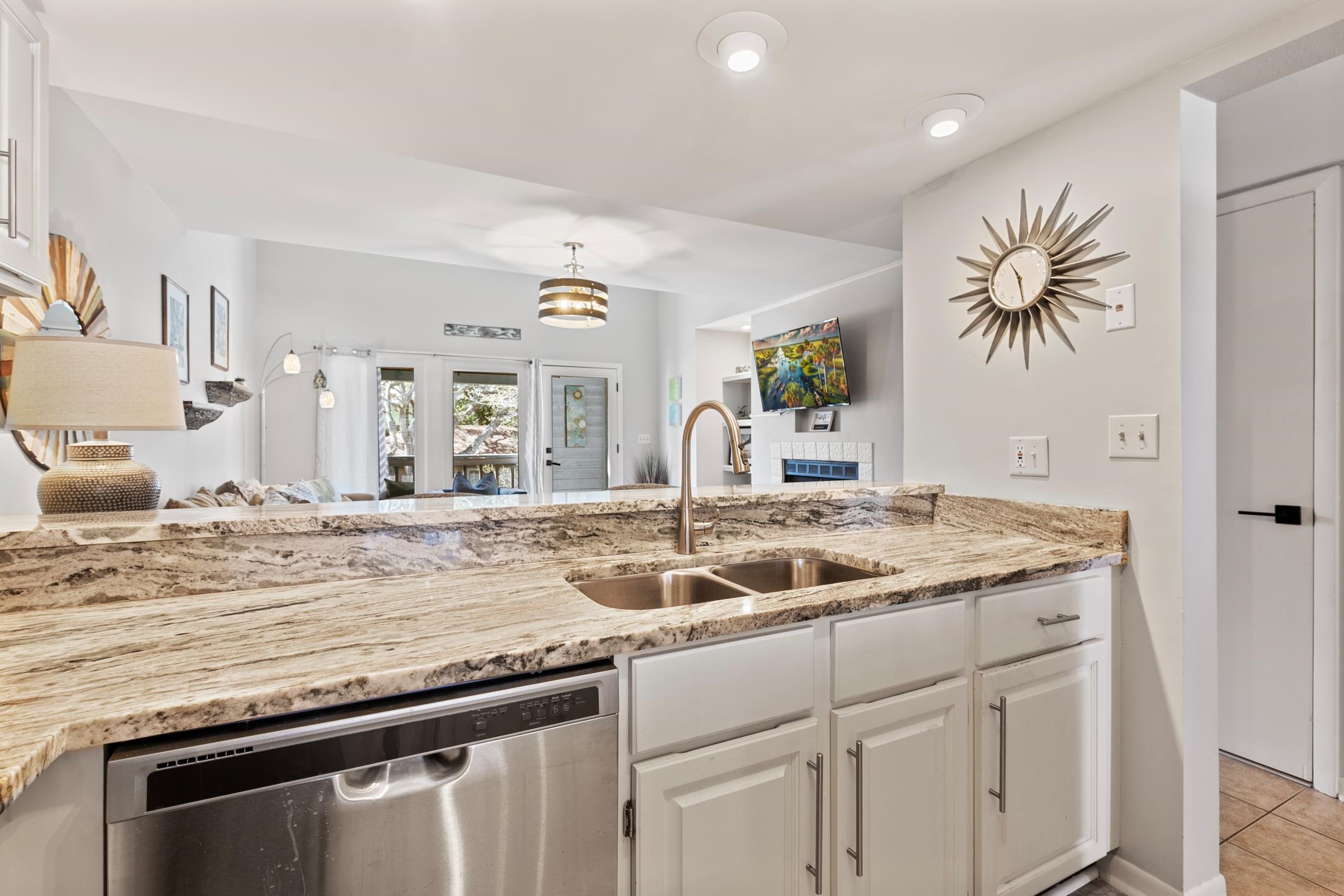 200 16th Street, Unit 202A St. Augustine, FL 32080 - Photo 14 of 39 a kitchen with a stove and a sink