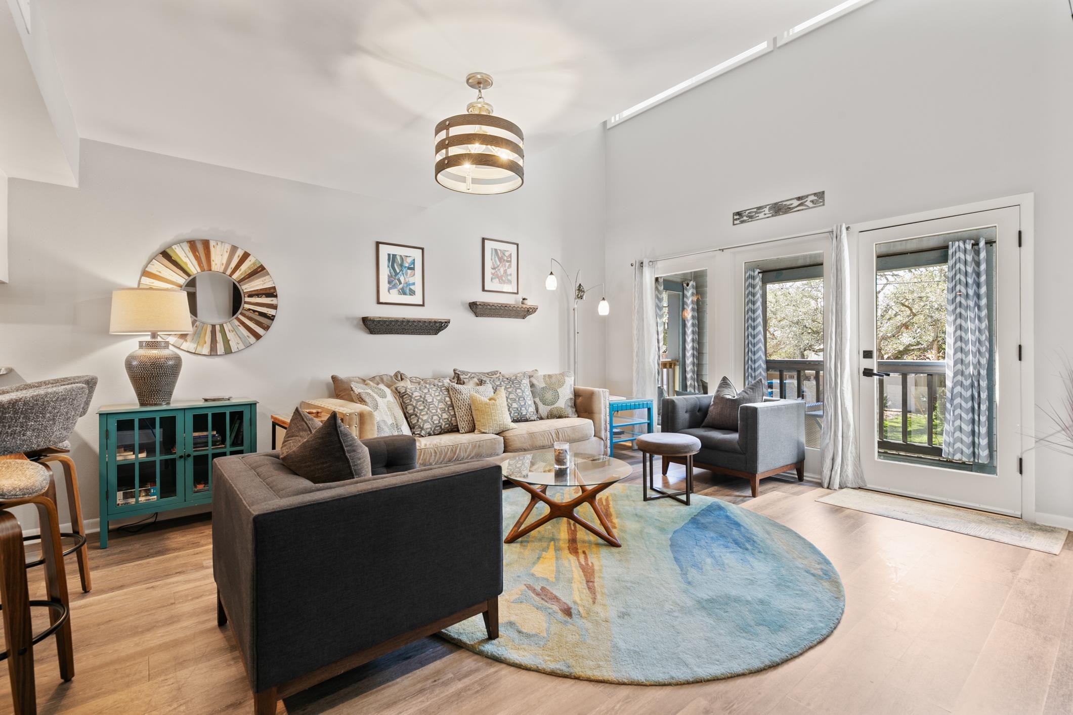200 16th Street, Unit 202A St. Augustine, FL 32080 - Photo 2 of 39 a living room with furniture and a table