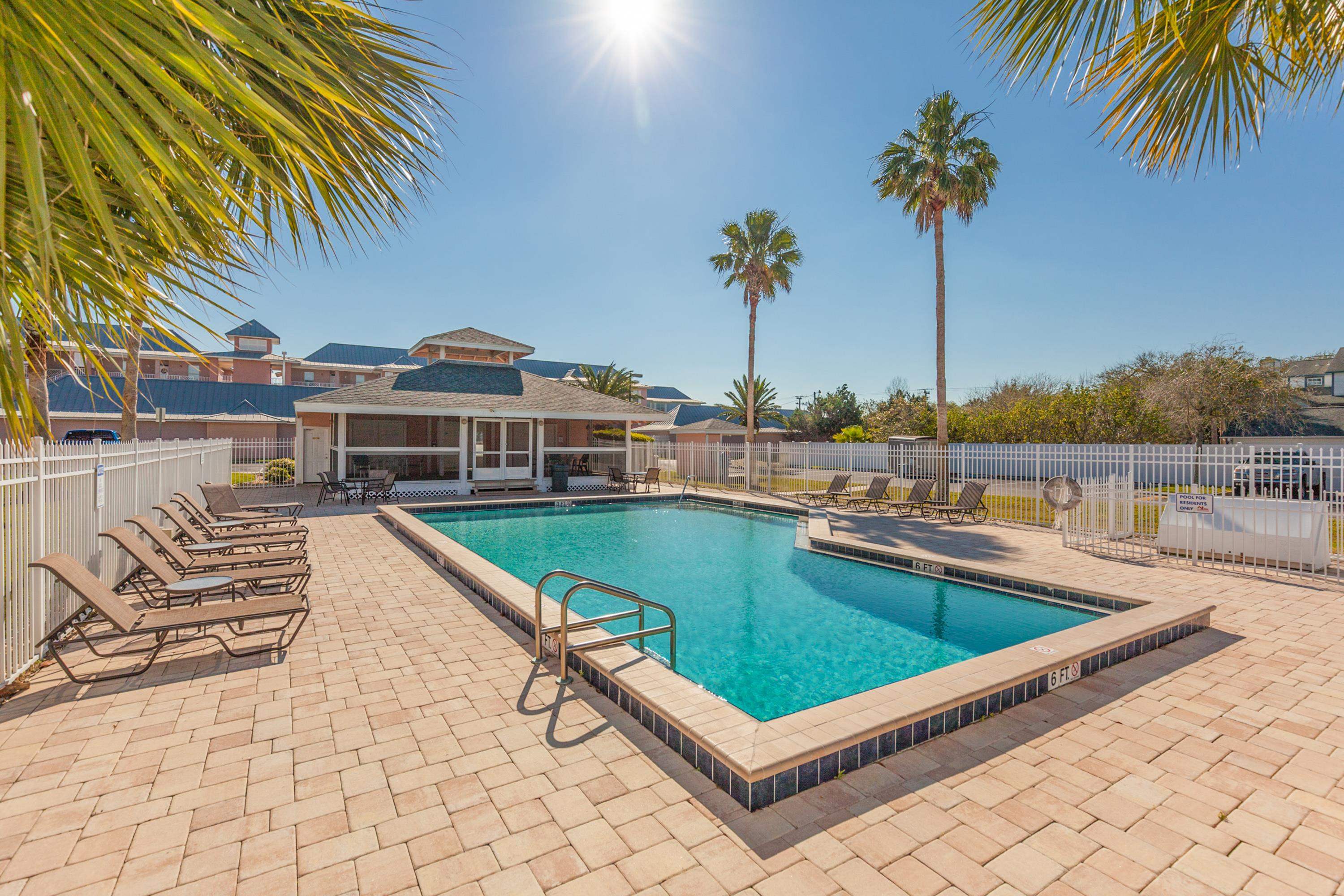 200 16th Street, Unit 202A St. Augustine, FL 32080 - Photo 35 of 39 swimming pool with outdoor seating
