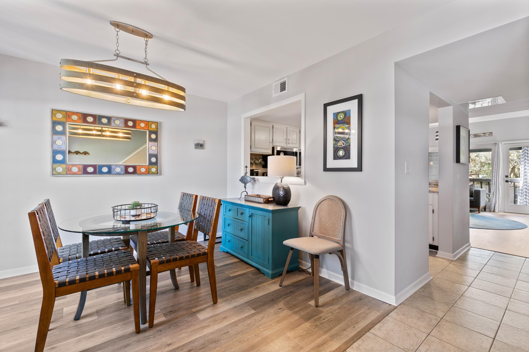 200 16th Street, Unit 202A St. Augustine, FL 32080 - Photo 9 of 39 a dining room with furniture and window