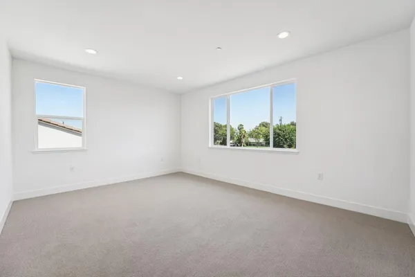 an empty room with windows