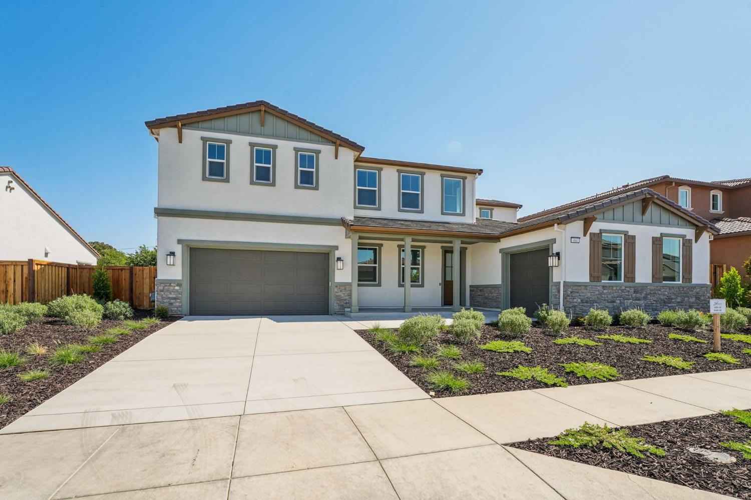 464 Trellis Way Brentwood, CA 94513 - Photo 2 of 22 a front view of a house with a yard