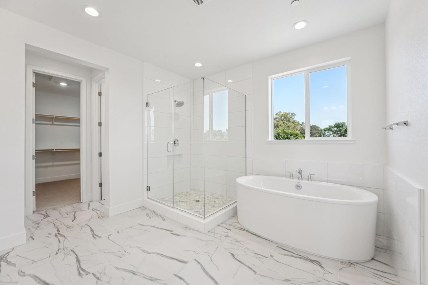 464 Trellis Way Brentwood, CA 94513 - Photo 21 of 22 a white bath tub sitting next to a bathroom sink