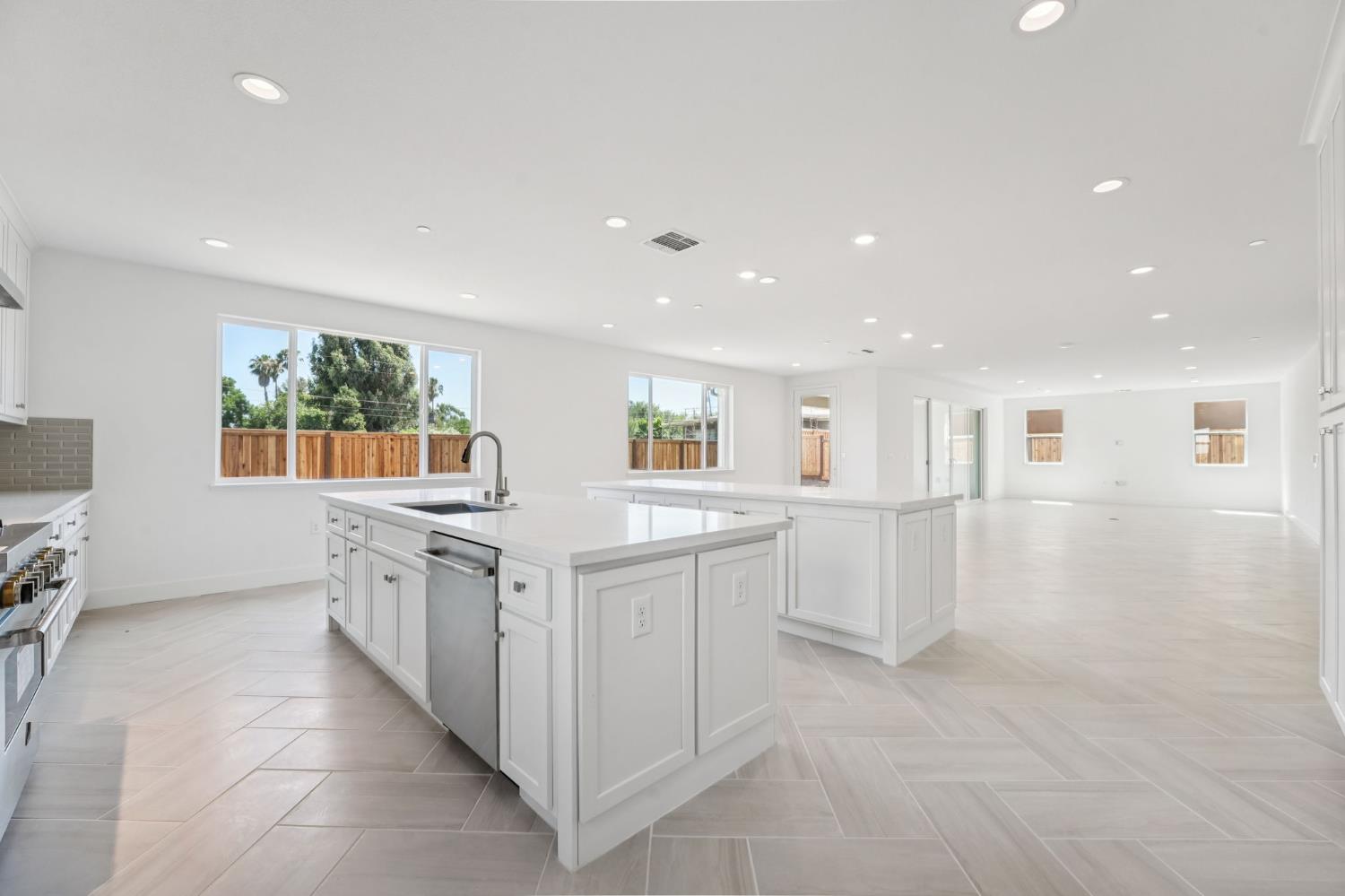 464 Trellis Way Brentwood, CA 94513 - Photo 7 of 22 a kitchen with white cabinets and sink