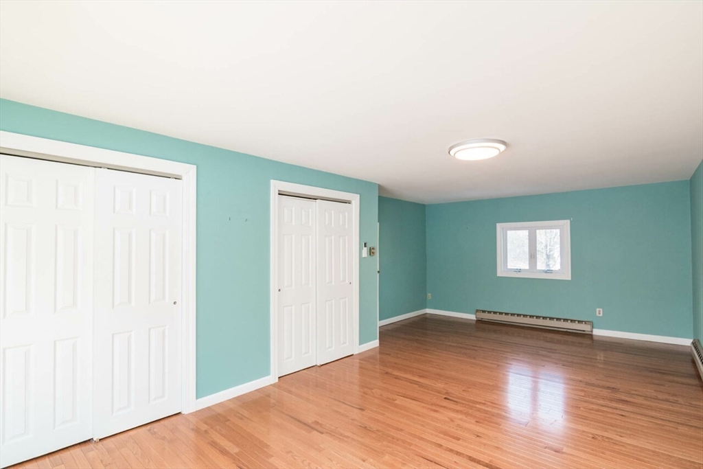 300 Main Road Westhampton, MA 01027 - Photo 17 of 35 a view of empty room with window and wooden floor