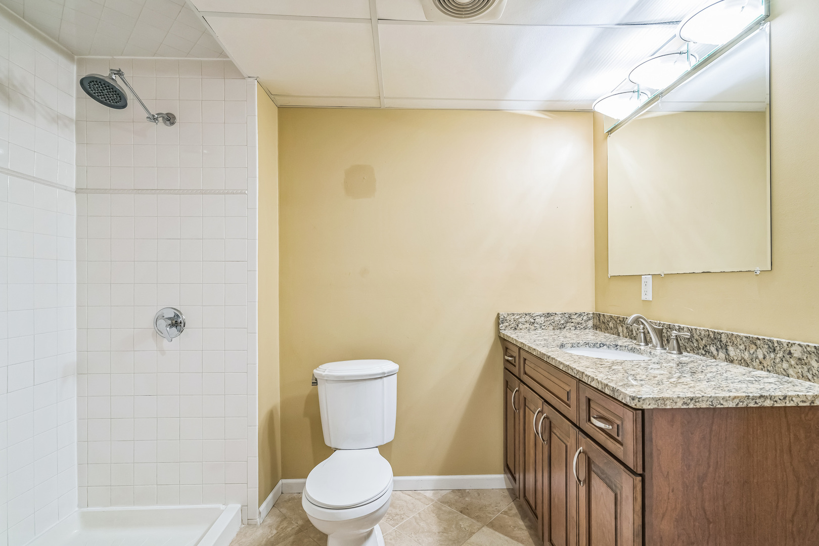 2604 Wendy Road Naperville, IL 60565 - Photo 45 of 62 a bathroom with a granite countertop sink toilet and shower