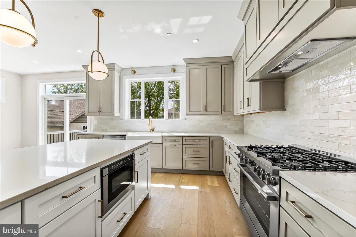 738 South Matlack Street West Chester, PA 19382 - Photo 12 of 23 a kitchen with a sink stove and cabinets