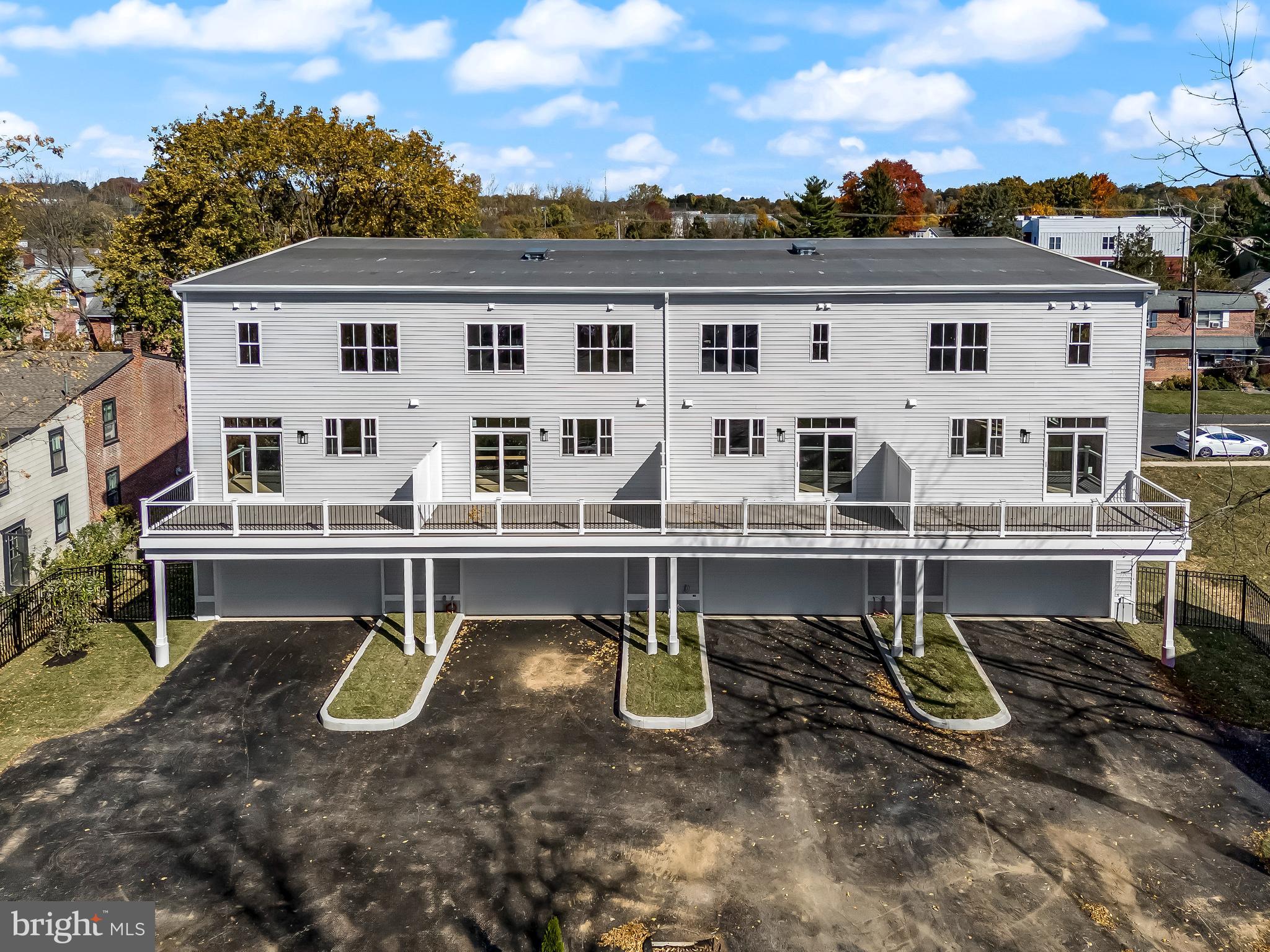 738 South Matlack Street West Chester, PA 19382 - Photo 22 of 23 a view of a patio with table and chairs with wooden floor and fence