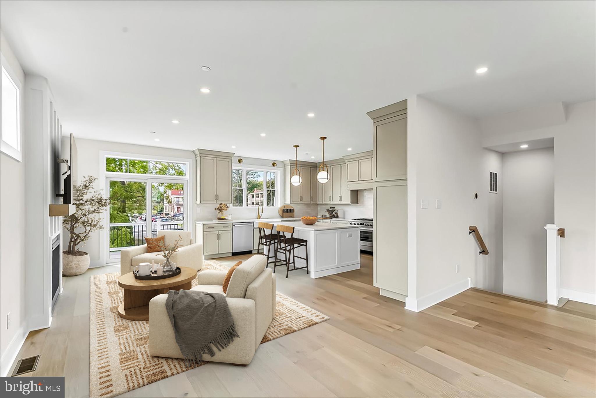 738 South Matlack Street West Chester, PA 19382 - Photo 6 of 23 a living room with furniture large window and wooden floor