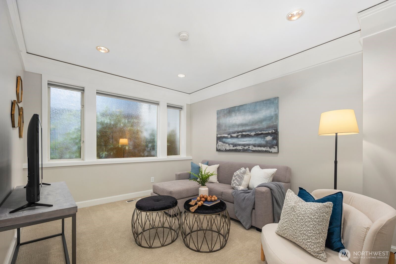 1717 Ferry Avenue Southwest Seattle, WA 98116 - Photo 14 of 37 a living room with furniture and a flat screen tv