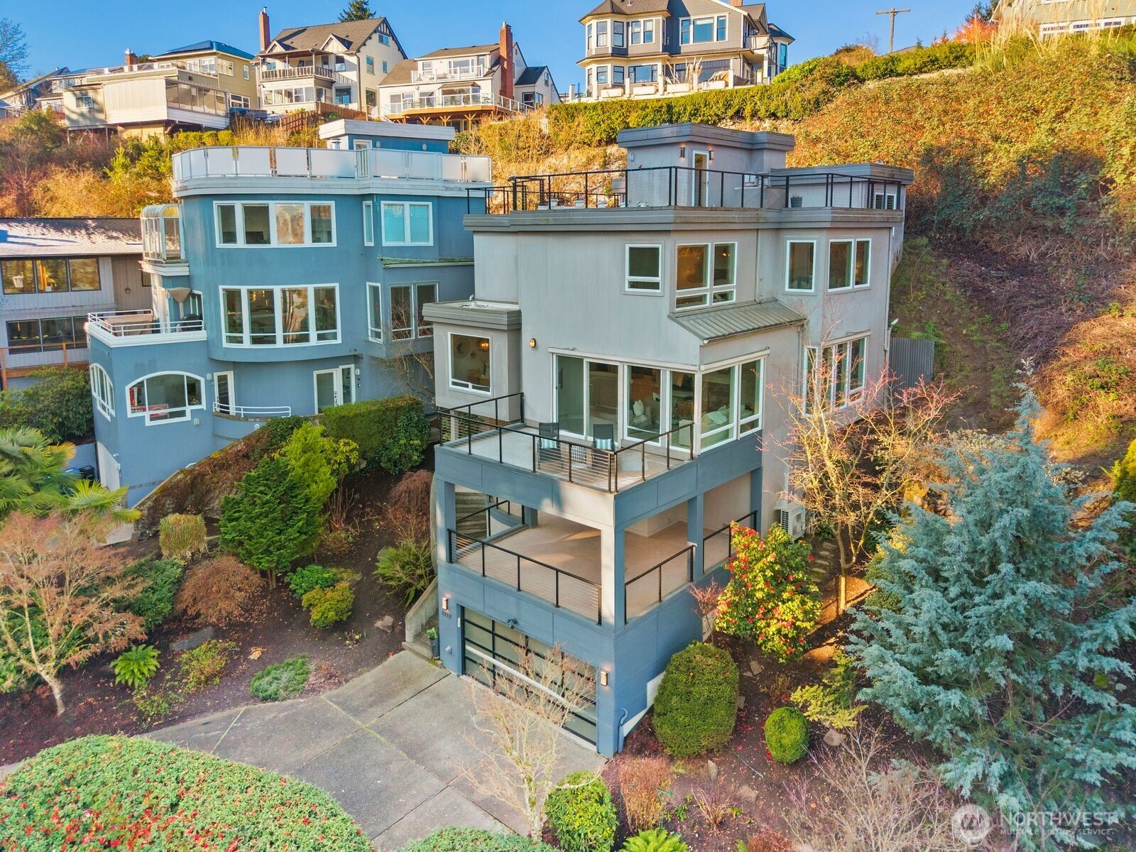 1717 Ferry Avenue Southwest Seattle, WA 98116 - Photo 36 of 37 a front view of a residential apartment building with a yard