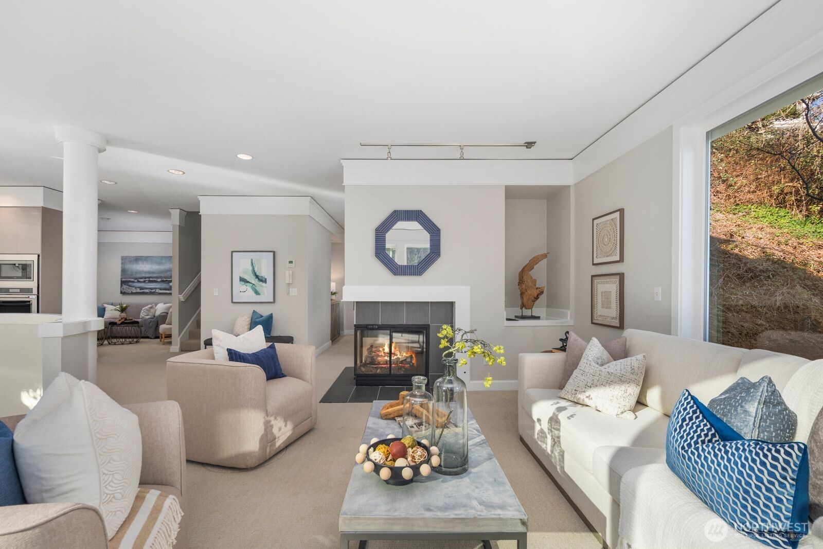 1717 Ferry Avenue Southwest Seattle, WA 98116 - Photo 6 of 37 a living room with furniture a fireplace and a window