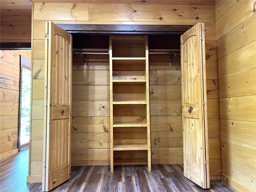 138 Talon Drive Boone, NC 28607 - Photo 13 of 25 a view of walk in closet with empty racks