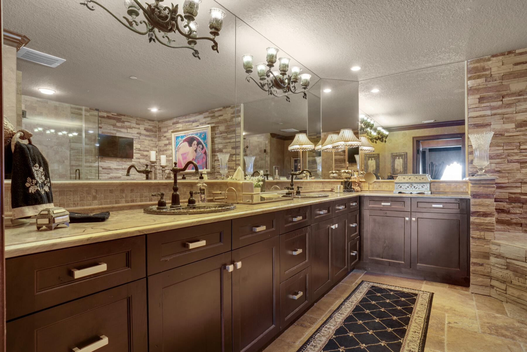 770 Harbor Boulevard, Unit 3E Destin, FL 32541 - Photo 18 of 44 a bathroom with a sink vanity and a mirror