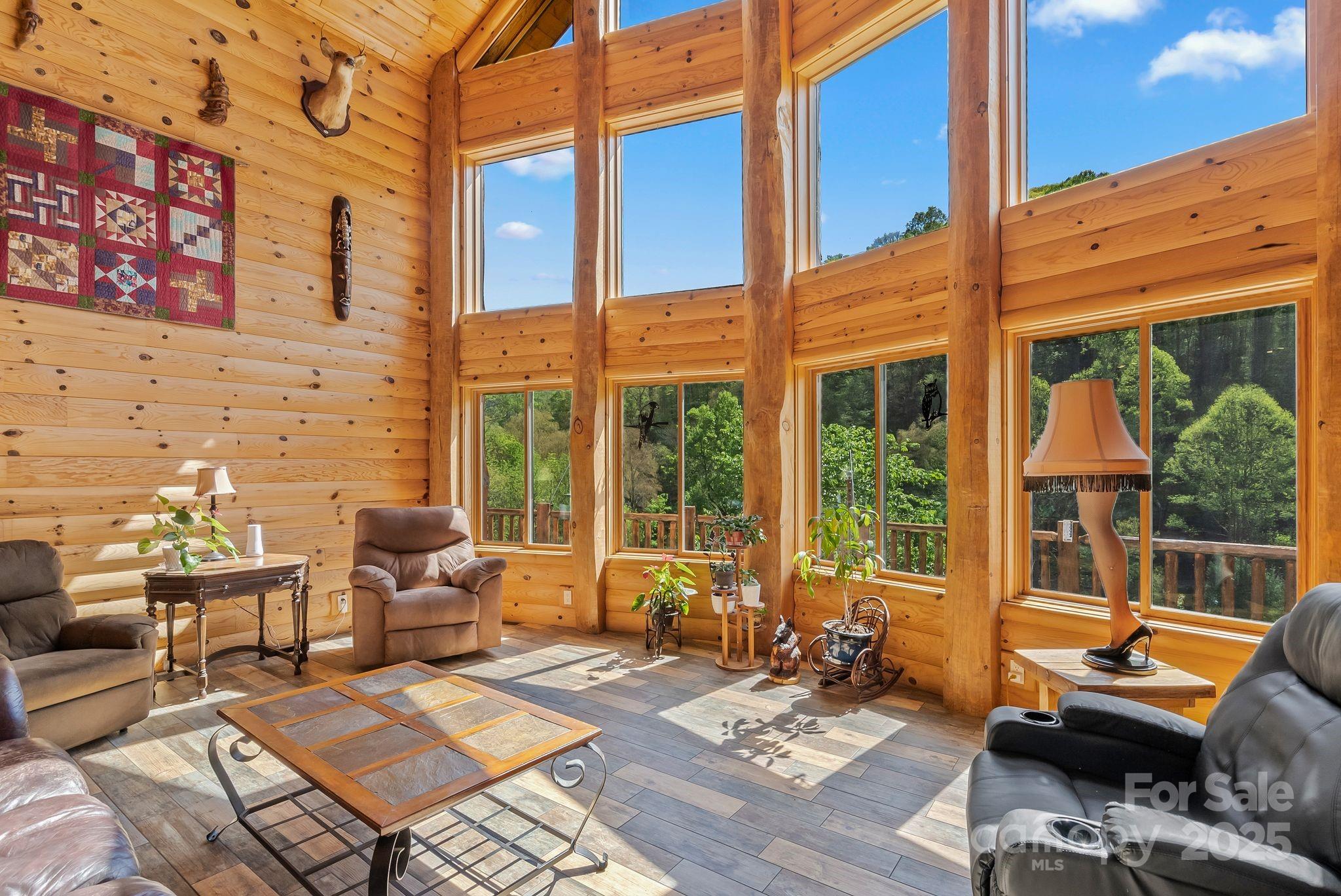 1104 Long Br Road Marshall, NC 28753 - Photo 12 of 45 a view of a patio with a table and chairs