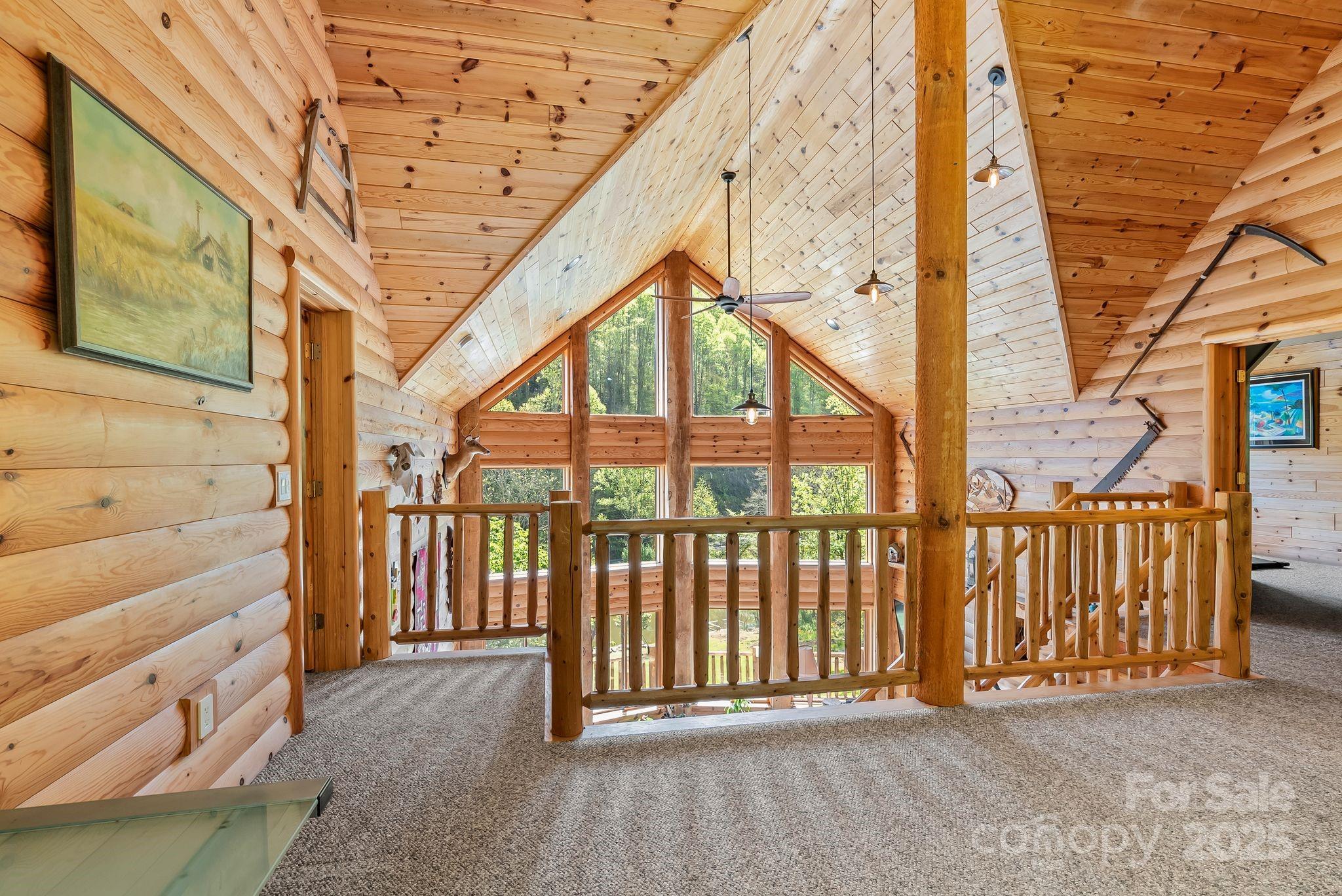 1104 Long Br Road Marshall, NC 28753 - Photo 25 of 45 a view of a porch with wooden floor