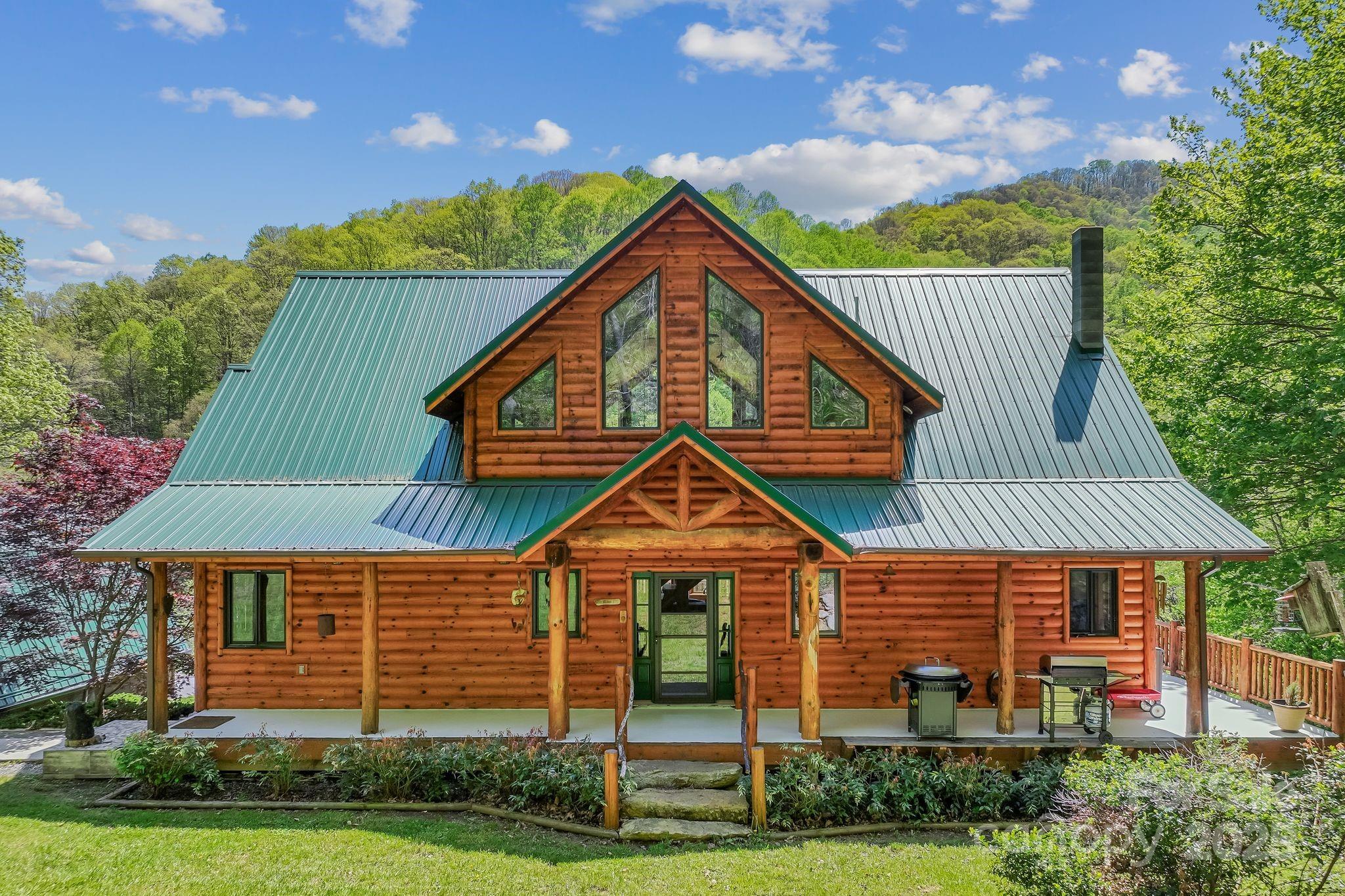 1104 Long Br Road Marshall, NC 28753 - Photo 3 of 45 a front view of a house with a yard