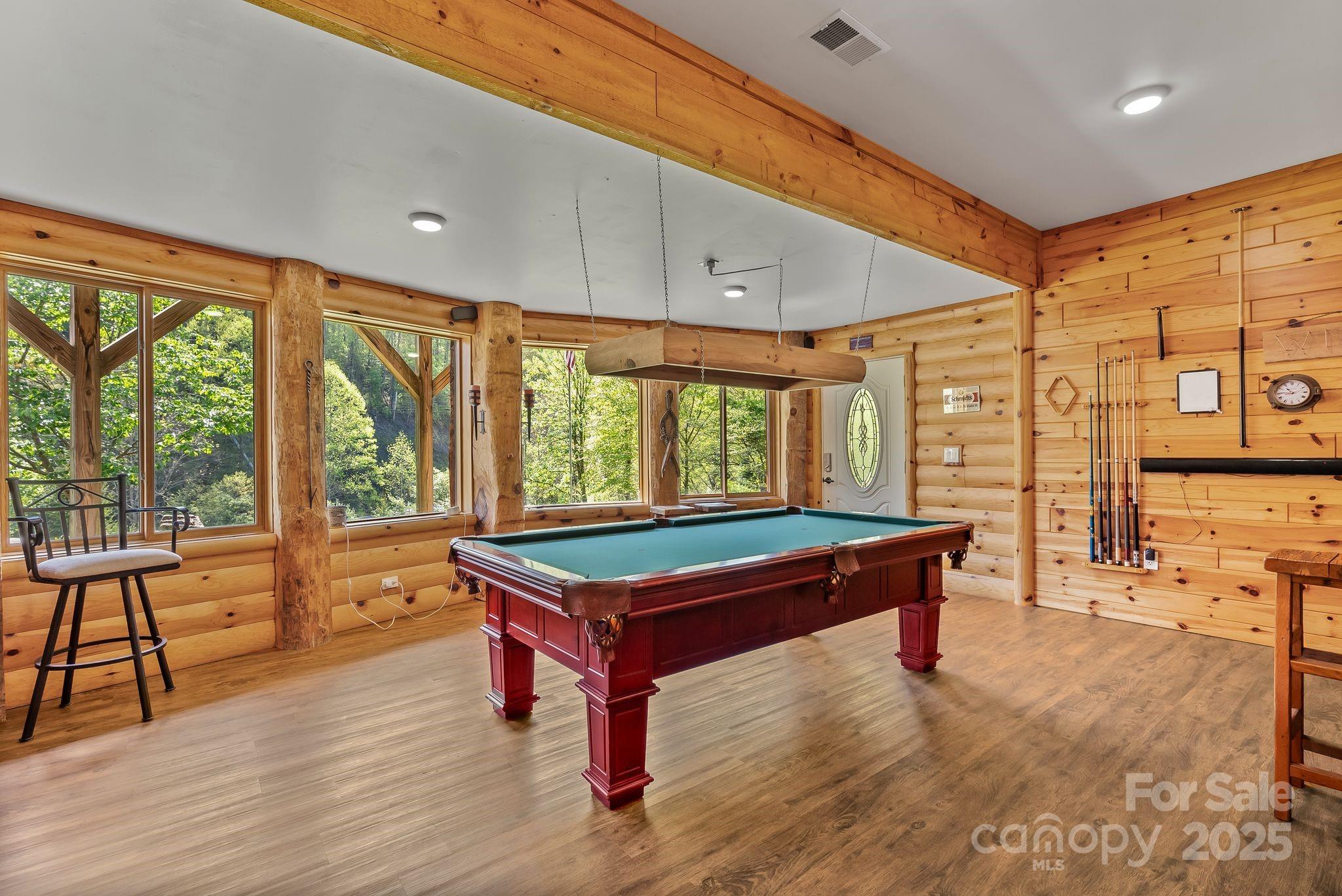 1104 Long Br Road Marshall, NC 28753 - Photo 31 of 45 a room with furniture pool table wooden floor and windows