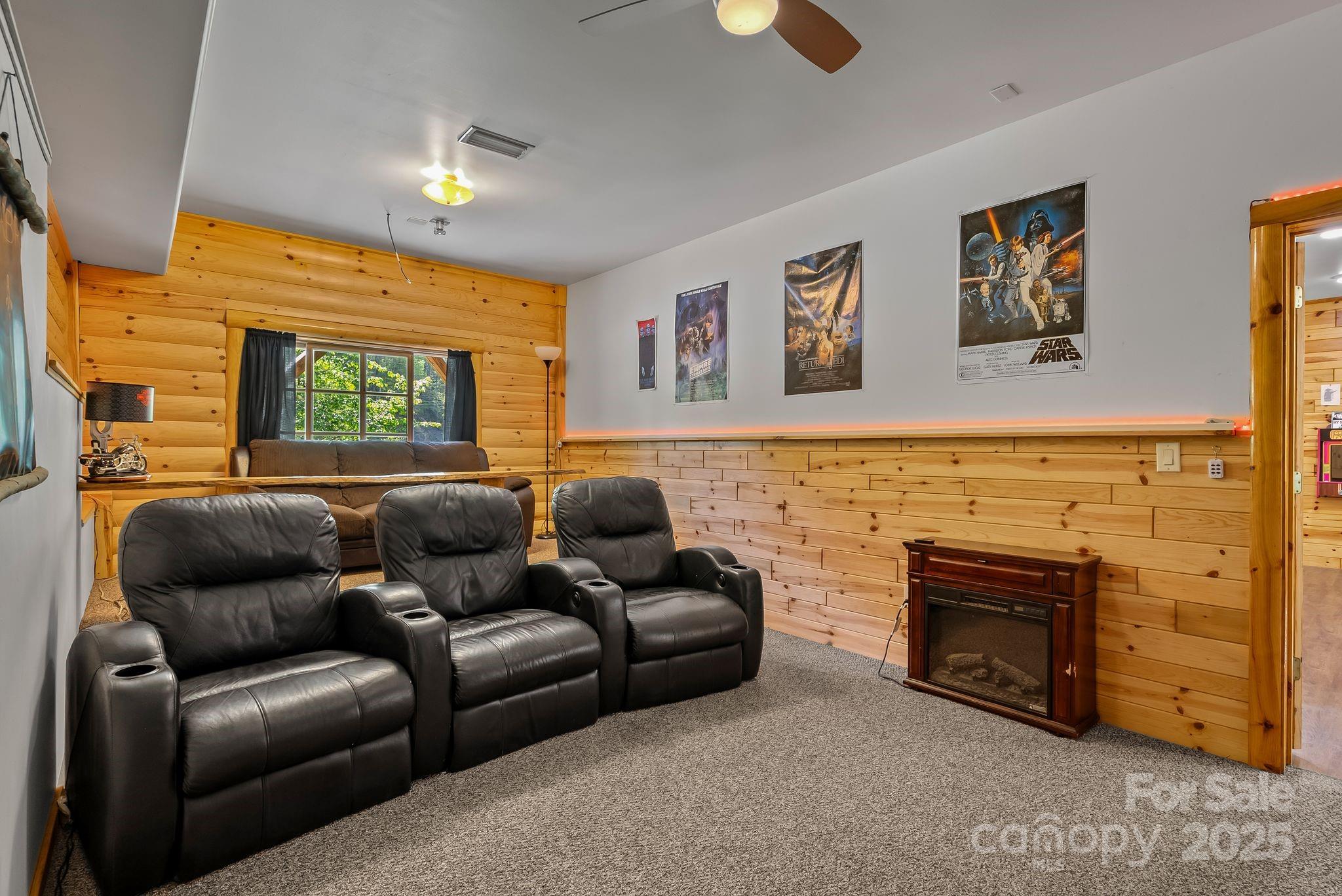 1104 Long Br Road Marshall, NC 28753 - Photo 33 of 45 a living room with furniture and a fireplace