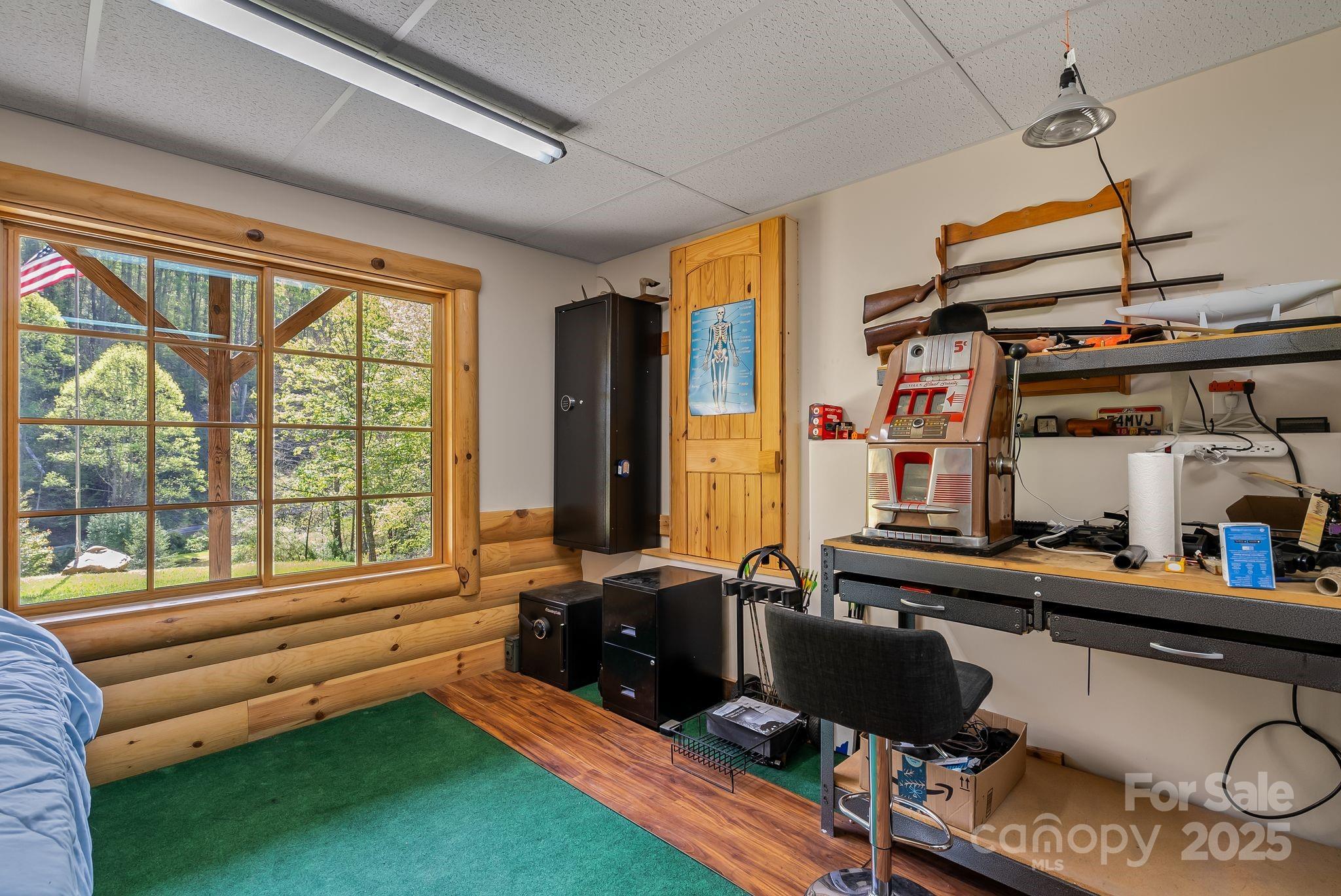 1104 Long Br Road Marshall, NC 28753 - Photo 35 of 45 a room with furniture and a window