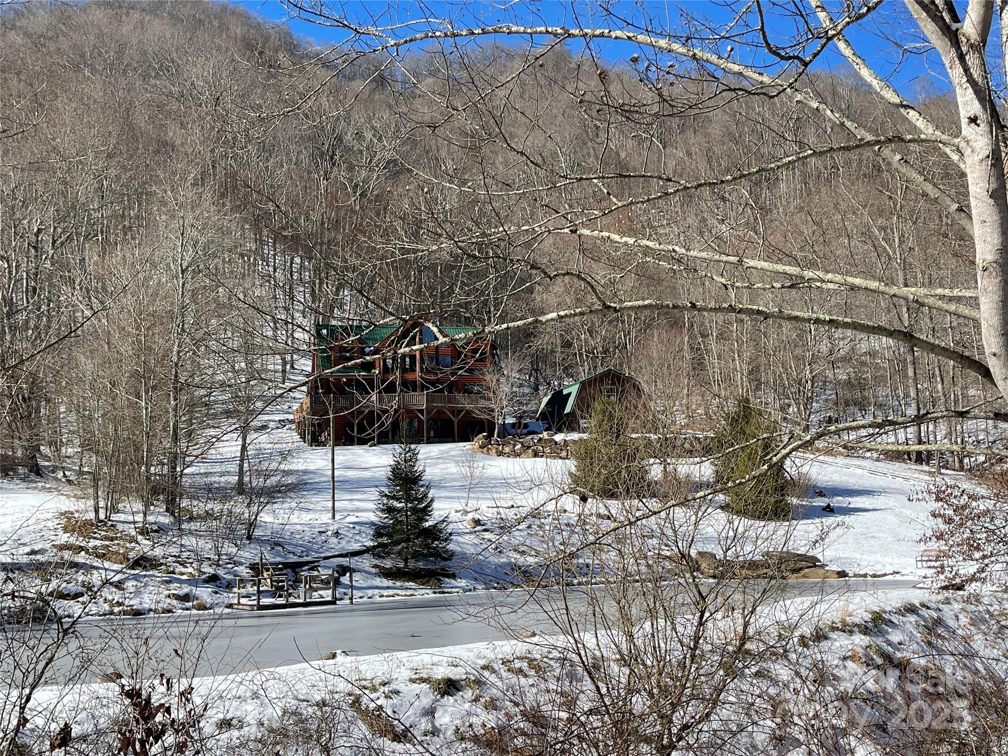 1104 Long Br Road Marshall, NC 28753 - Photo 5 of 45 a view of street with a building