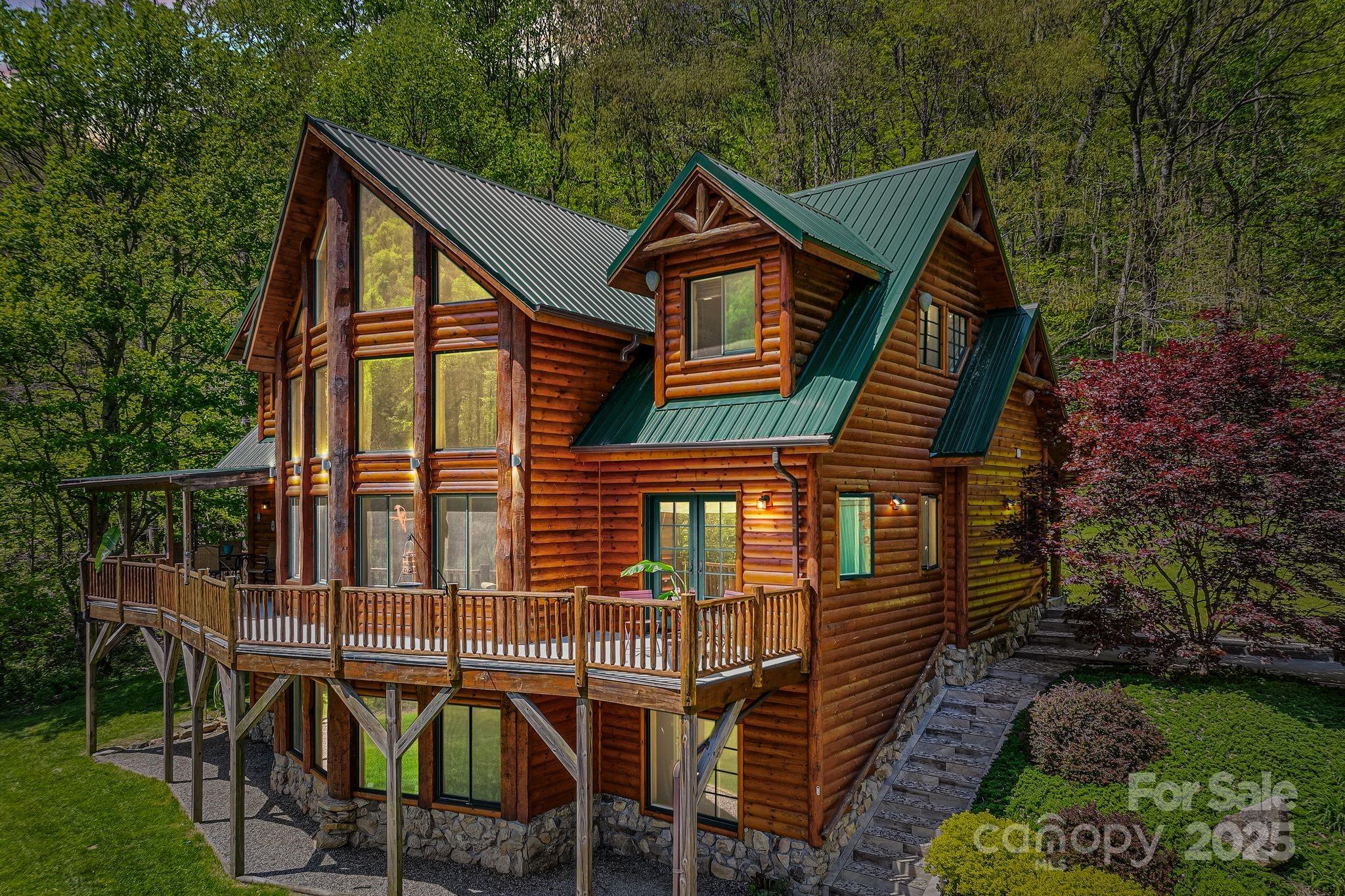 1104 Long Br Road Marshall, NC 28753 - Photo 6 of 45 a view of a house with backyard and porch