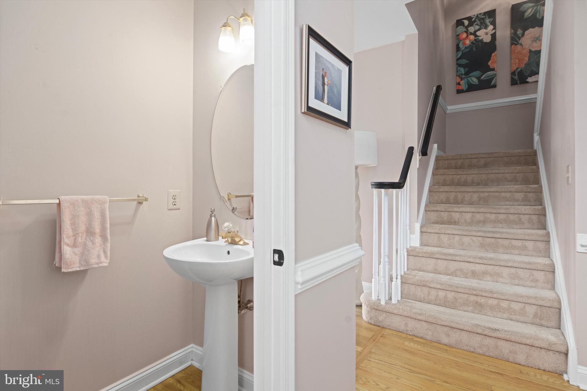 1149 Brian's Way Wayne, PA 19087 - Photo 16 of 37 a bathroom with a sink and a mirror