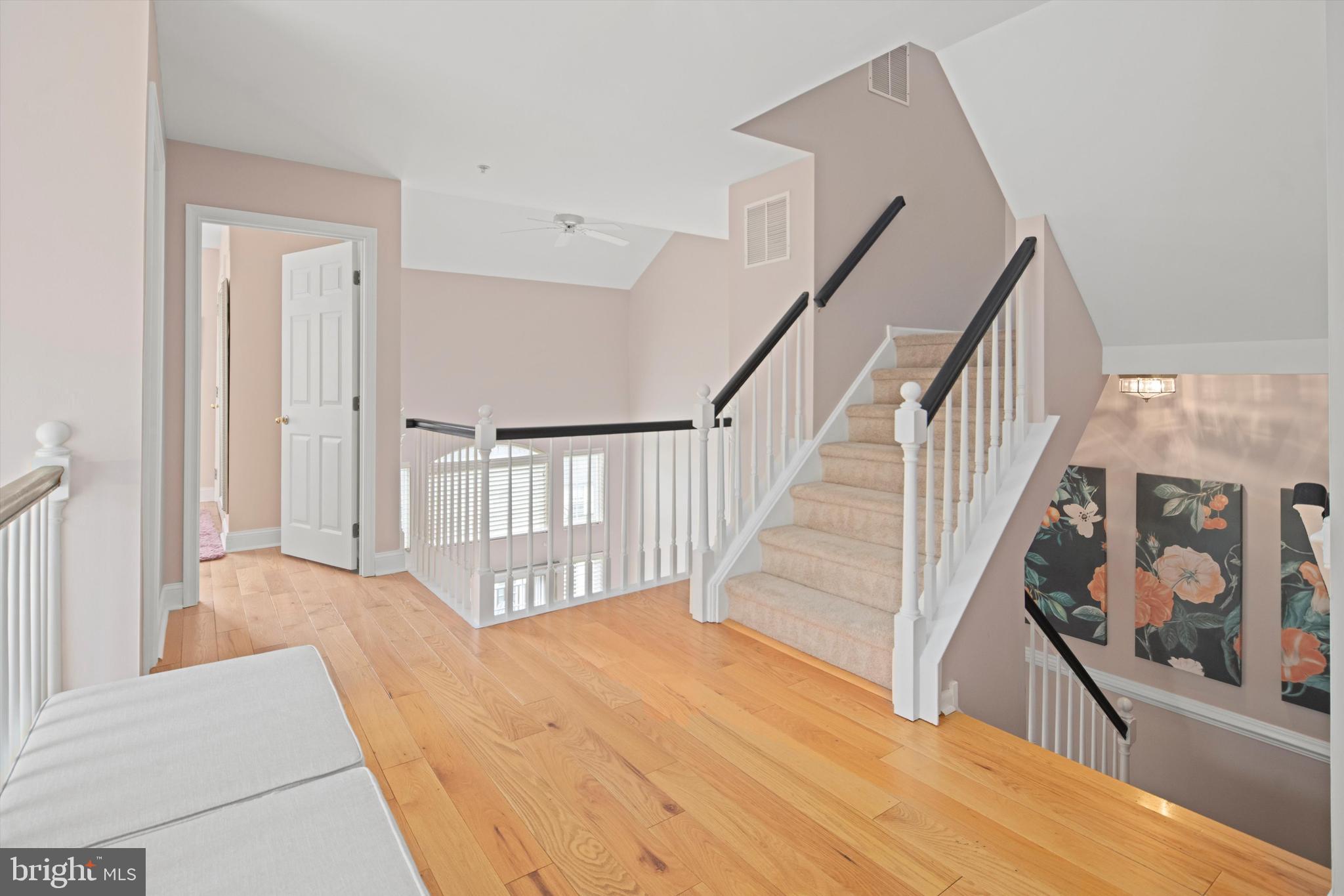 1149 Brian's Way Wayne, PA 19087 - Photo 17 of 37 a view of a bedroom with wooden floor and stairs