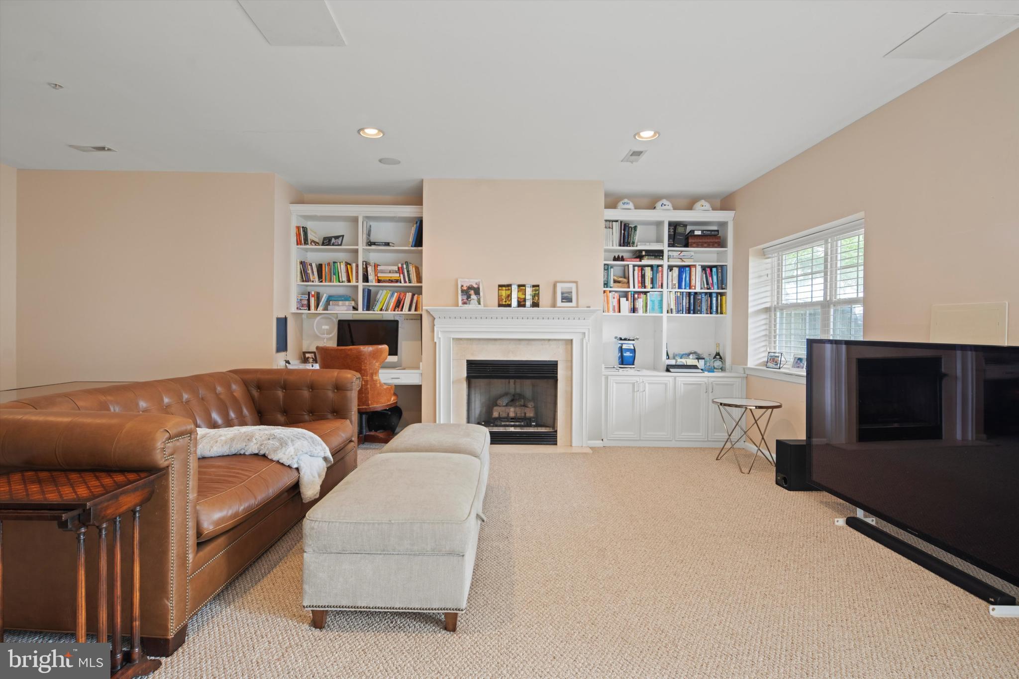1149 Brian's Way Wayne, PA 19087 - Photo 29 of 37 a living room with furniture and a fireplace