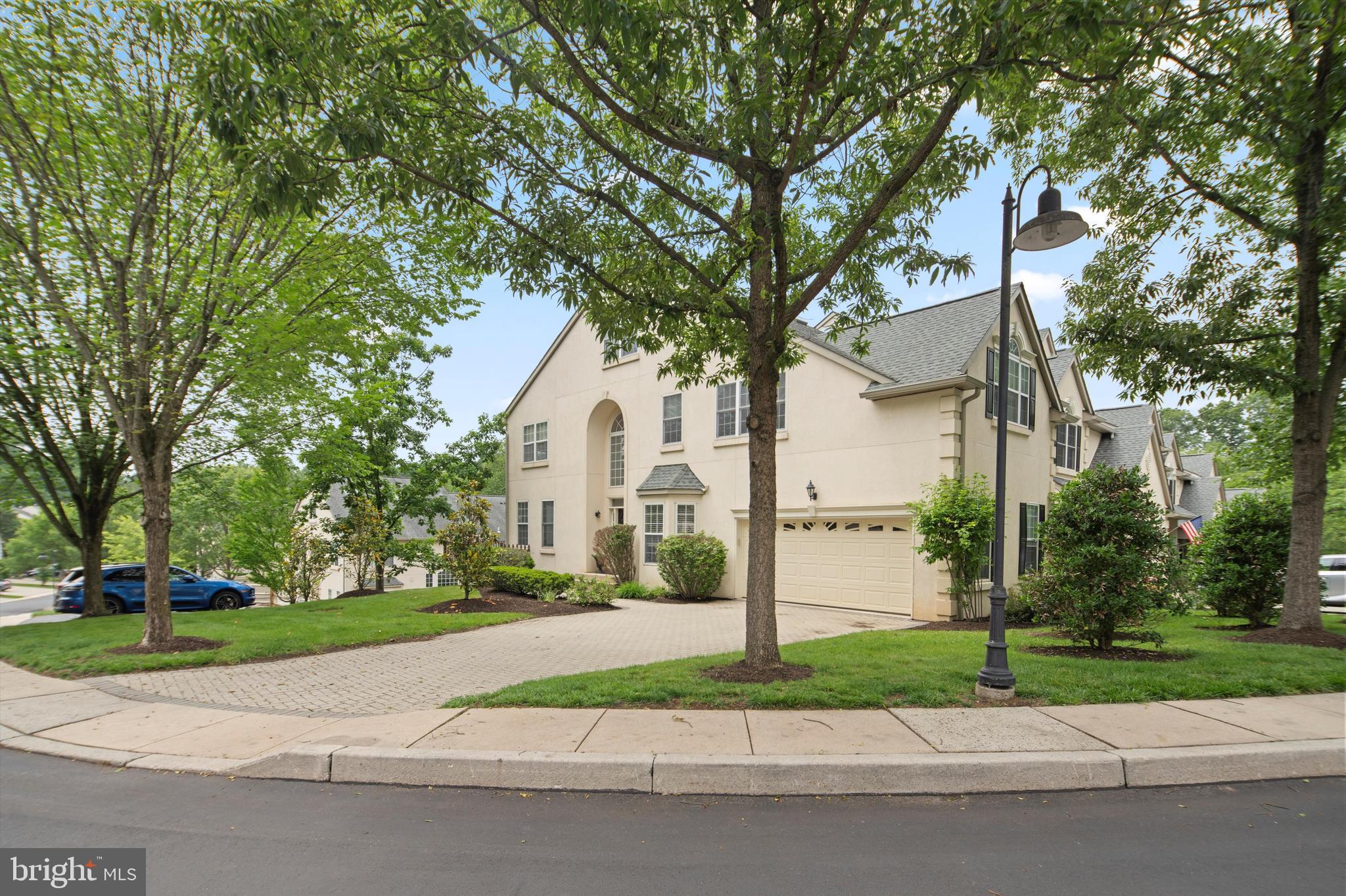 1149 Brian's Way Wayne, PA 19087 - Photo 34 of 37 a white house that has a tree in front of it