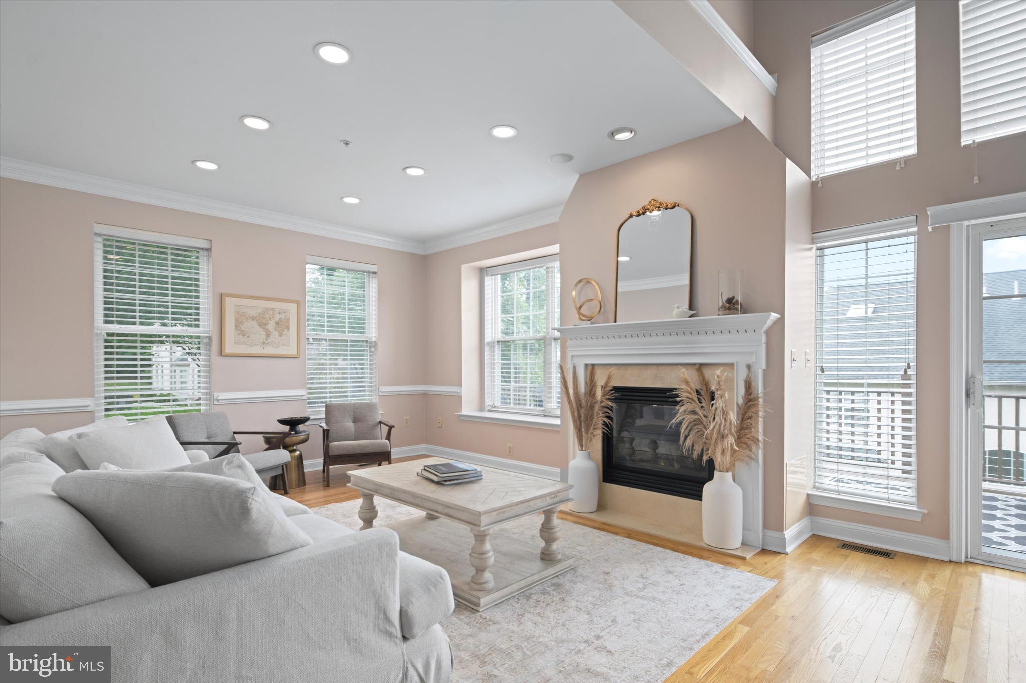 1149 Brian's Way Wayne, PA 19087 - Photo 7 of 37 a living room with furniture and a fireplace