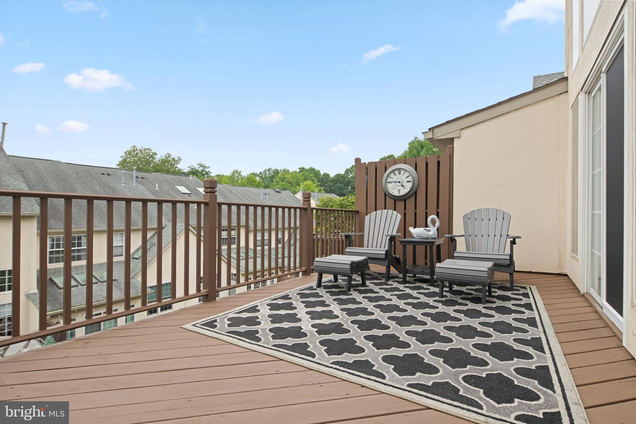 1149 Brian's Way Wayne, PA 19087 - Photo 9 of 37 a view of a balcony with wooden chairs and iron fence