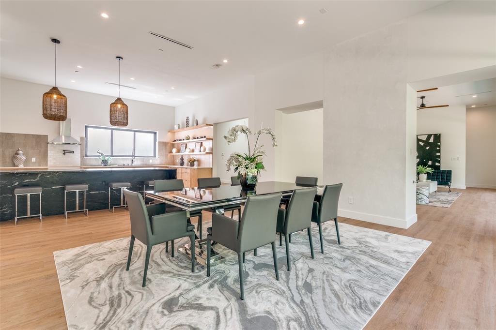 823 West Danieldale Road Duncanville, TX 75137 - Photo 11 of 36 a view of a dining room with furniture and wooden floor