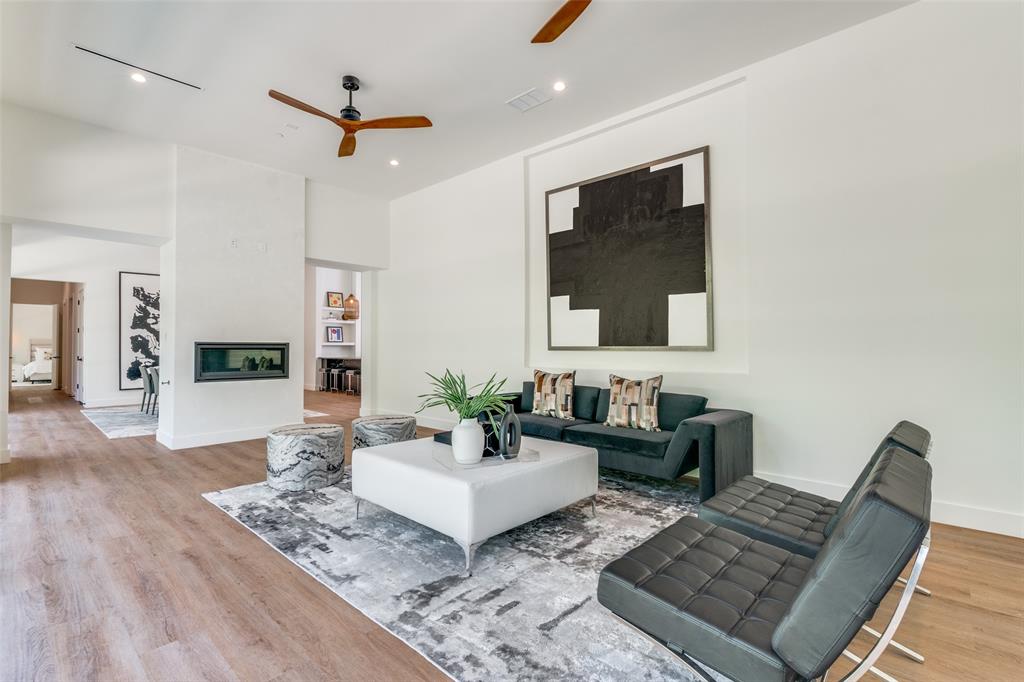 823 West Danieldale Road Duncanville, TX 75137 - Photo 16 of 36 a living room with furniture and a flat screen tv
