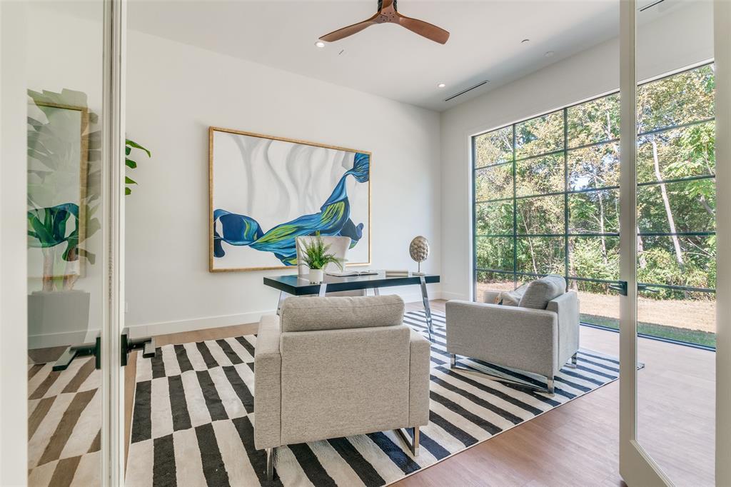823 West Danieldale Road Duncanville, TX 75137 - Photo 17 of 36 a living room with furniture and a large window