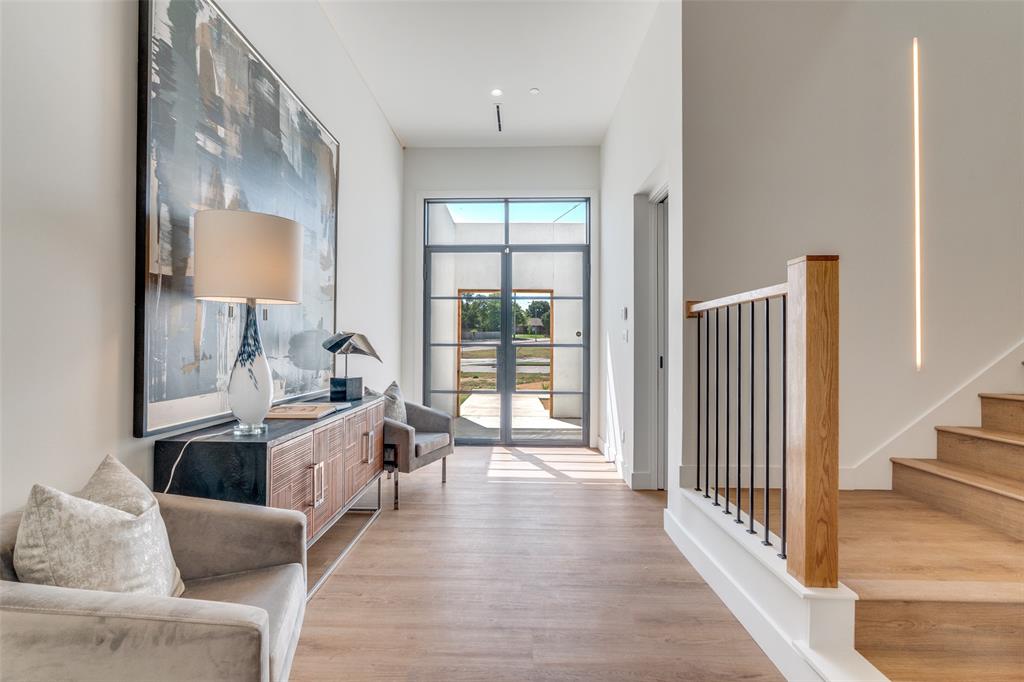 823 West Danieldale Road Duncanville, TX 75137 - Photo 3 of 36 a view of a livingroom with furniture and wooden floor