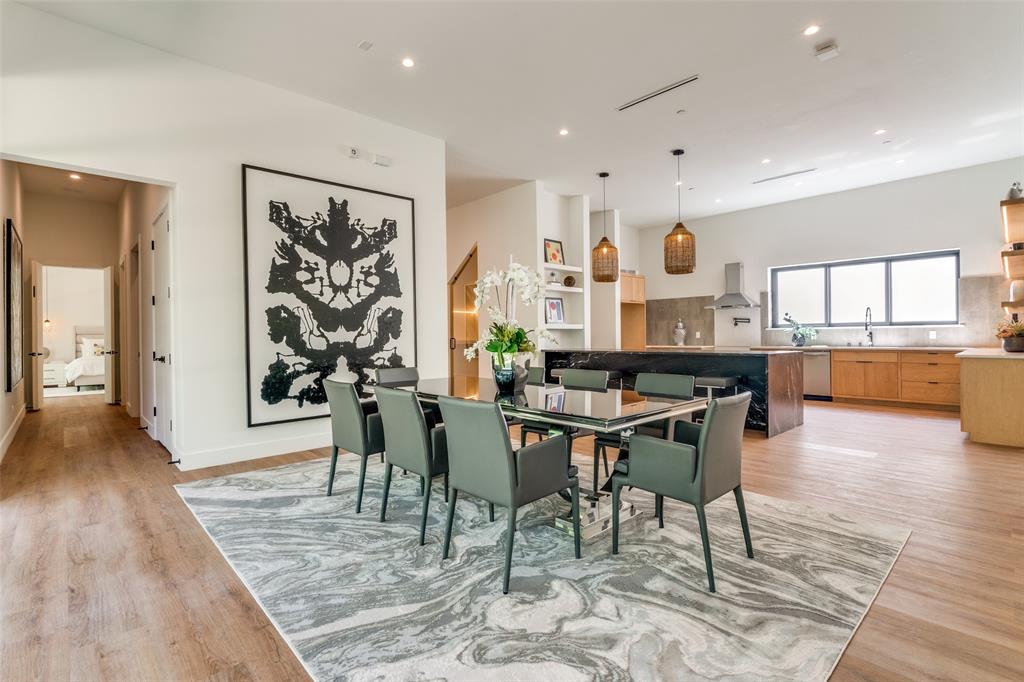 823 West Danieldale Road Duncanville, TX 75137 - Photo 10 of 36 a view of a dining room with furniture and wooden floor