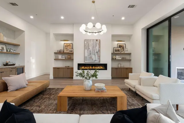 a kitchen with a sink and a refrigerator
