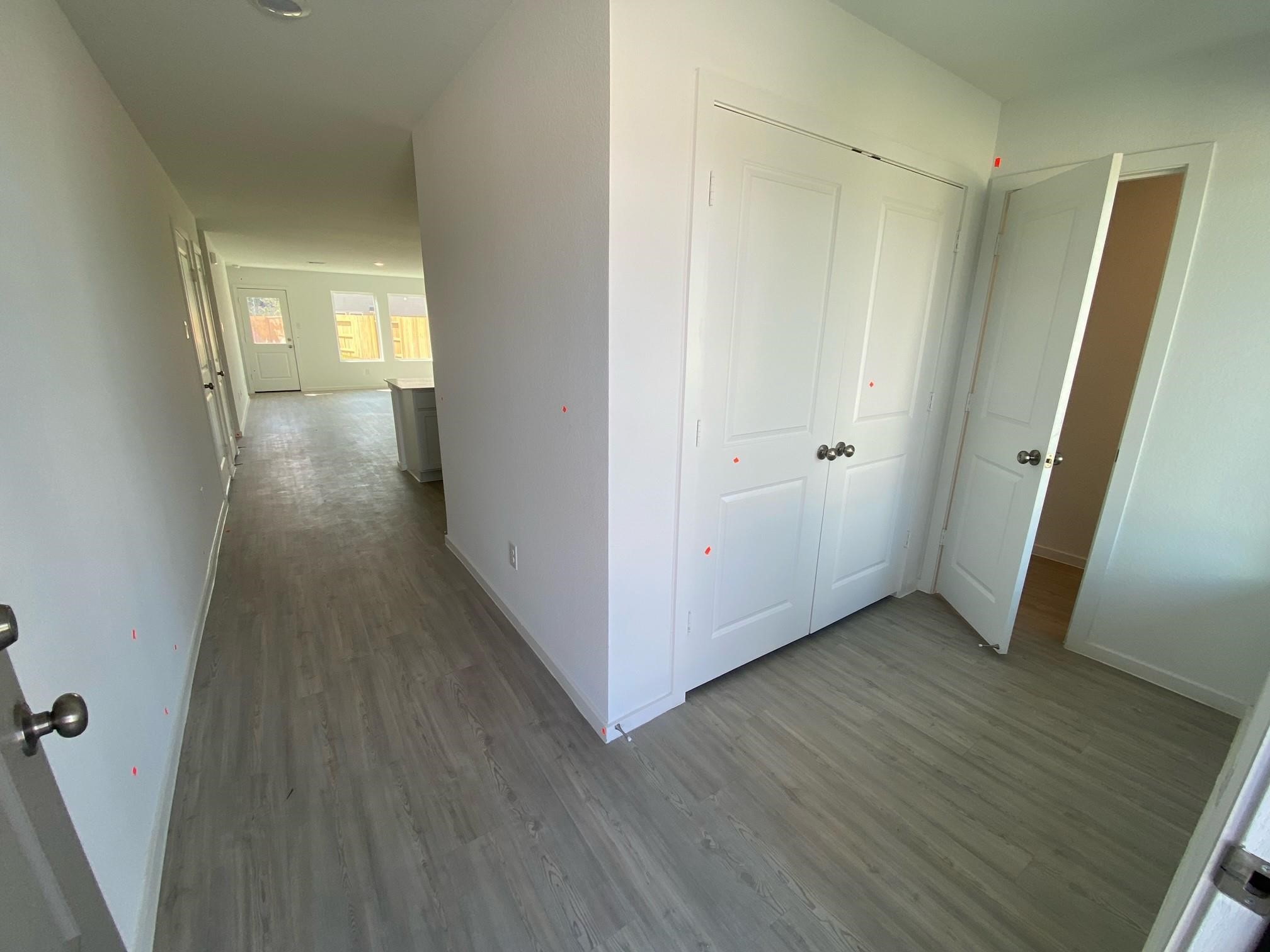 612 Burlina Road La Marque, TX 77568 - Photo 4 of 22 a view of a hallway with wooden floor