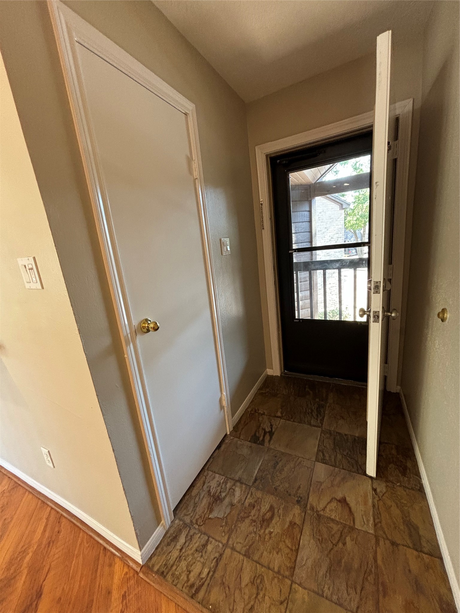 12755 Mill Ridge Drive, Unit 309 Cypress, TX 77429 - Photo 9 of 33 slate entry way with coat closet