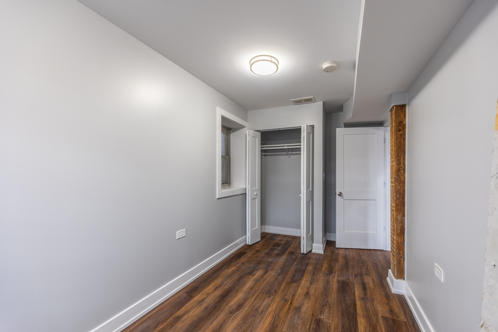 3328 West Congress Parkway, Unit G Chicago, IL 60624 - Photo 9 of 12 a view of hallway with wooden floor
