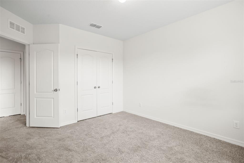3449 Seneca Club Loop, Unit 24101 Orlando, FL 32808 - Photo 17 of 29 a view of an empty room