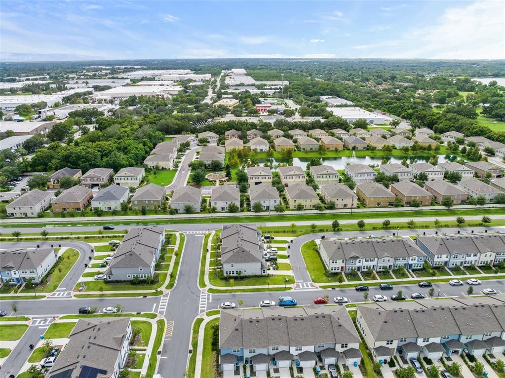3449 Seneca Club Loop, Unit 24101 Orlando, FL 32808 - Photo 24 of 29 a view of swimming pool with a yard and outdoor seating