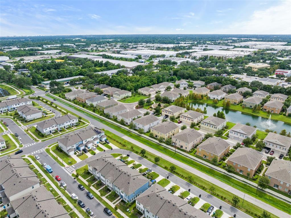 3449 Seneca Club Loop, Unit 24101 Orlando, FL 32808 - Photo 25 of 29 an aerial view of a city