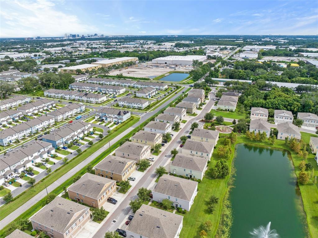 3449 Seneca Club Loop, Unit 24101 Orlando, FL 32808 - Photo 26 of 29 an aerial view of a city
