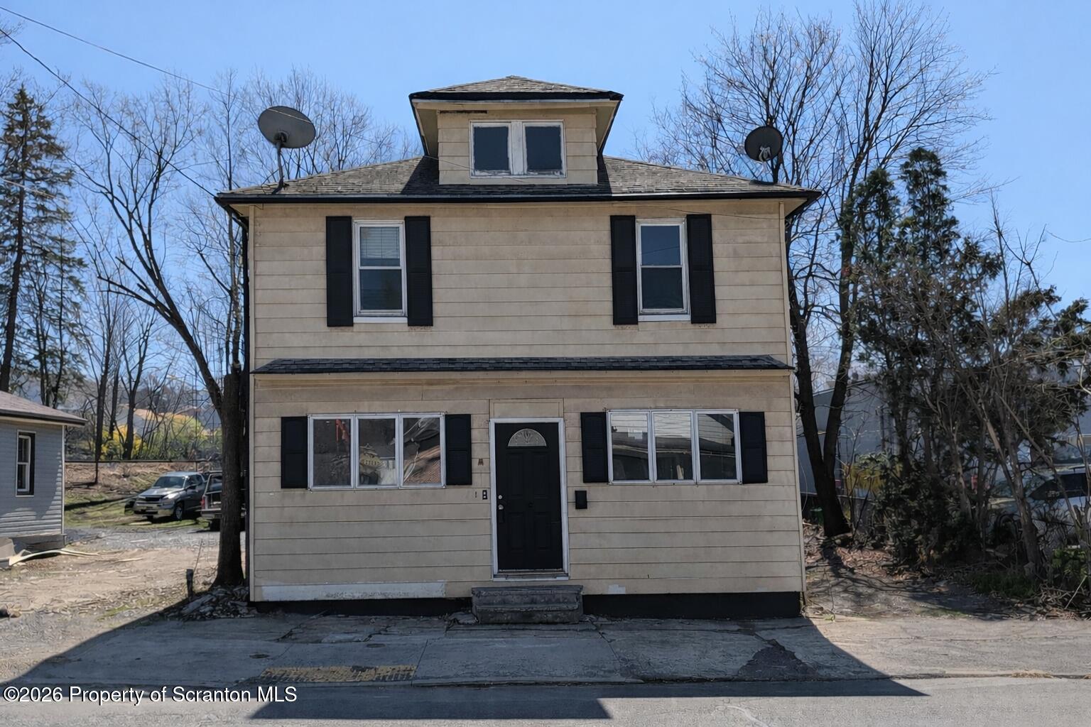 509 Main Street Duryea, PA 18642 - Photo 30 of 30 a front view of a house with a yard