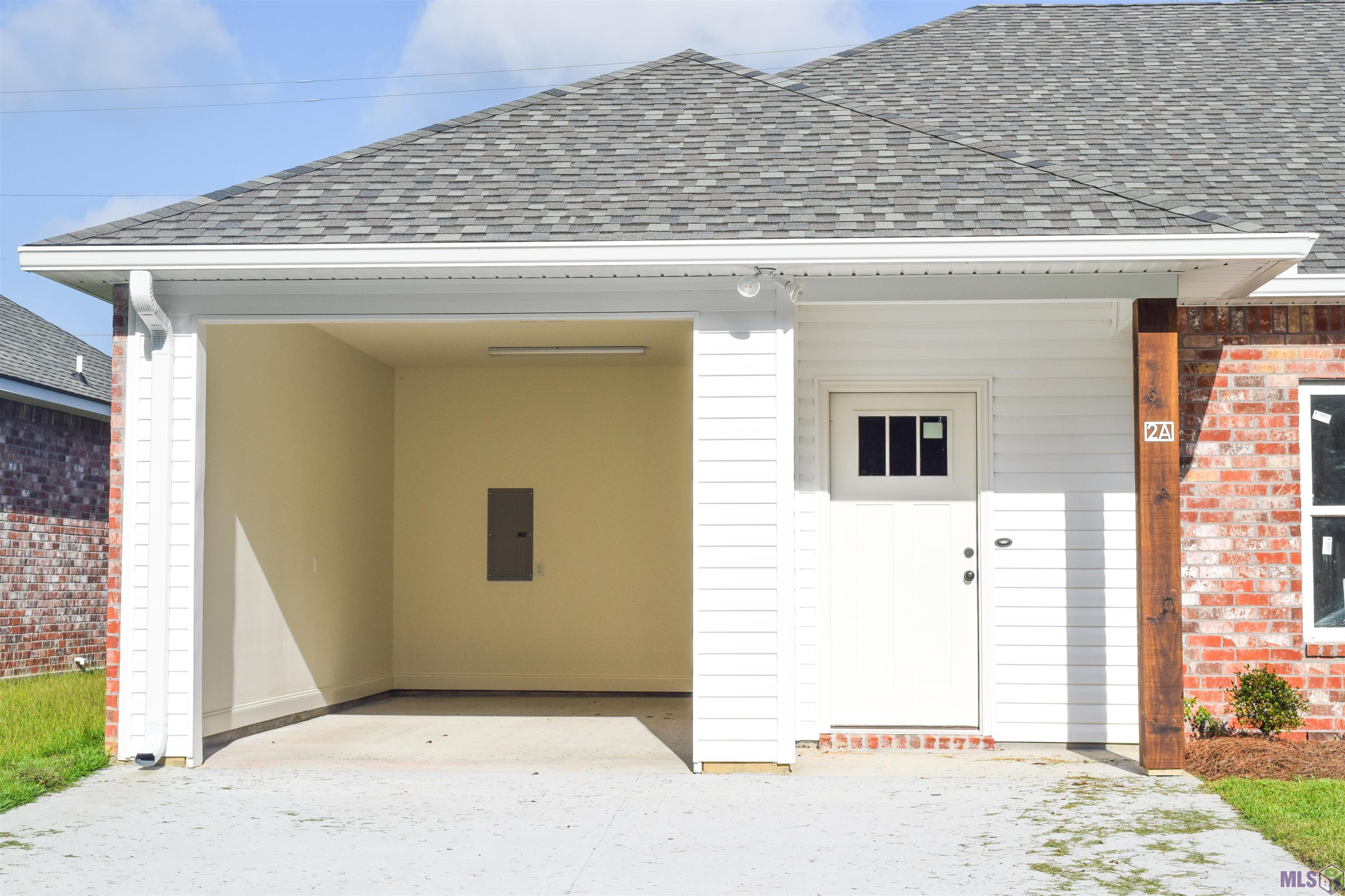 8073 Arnold Road, Unit 3B Denham Springs, LA 70726 - Photo 1 of 6 Townhome Front