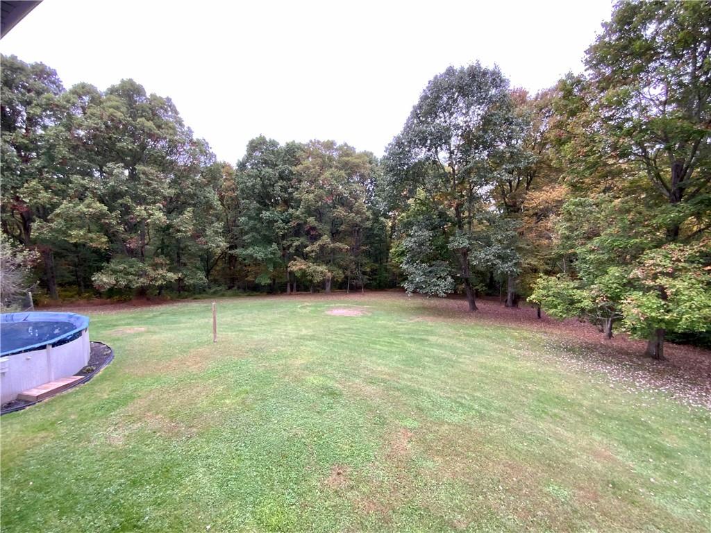 245 Murdocksville Road Clinton, PA 15026 - Photo 26 of 28 a backyard of a house with lots of green space