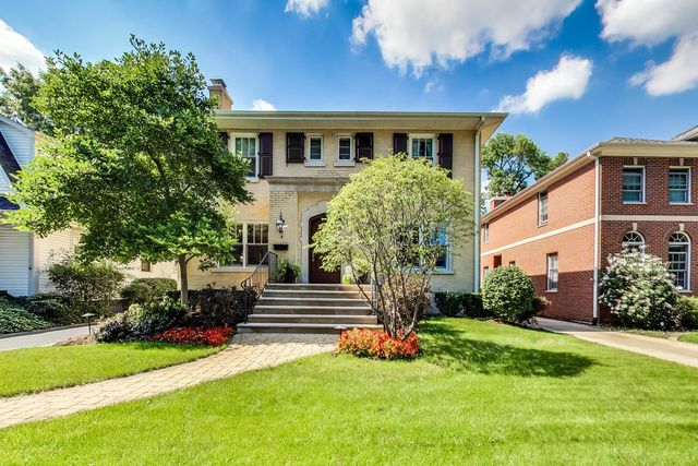 416 Wisner Street Park Ridge, IL 60068 - Photo 1 of 49 a front view of house with yard and green space