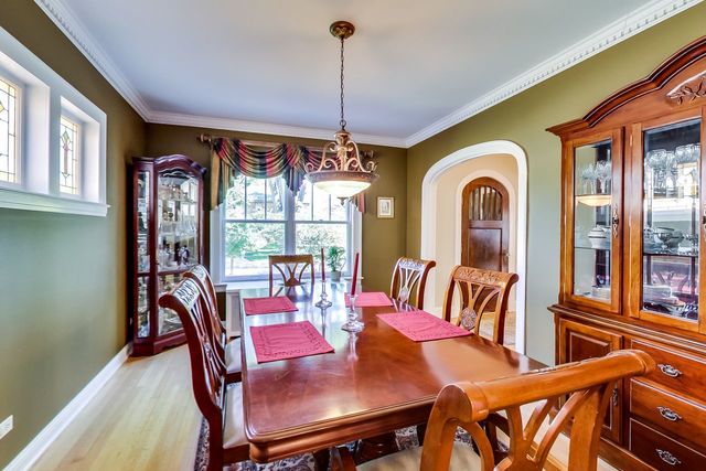 416 Wisner Street Park Ridge, IL 60068 - Photo 11 of 49 a view of a dining room with furniture window and wooden floor